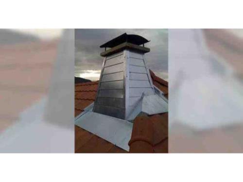 Entourage de cheminée en zinc