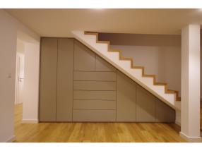 Built-in cabinet under stairs